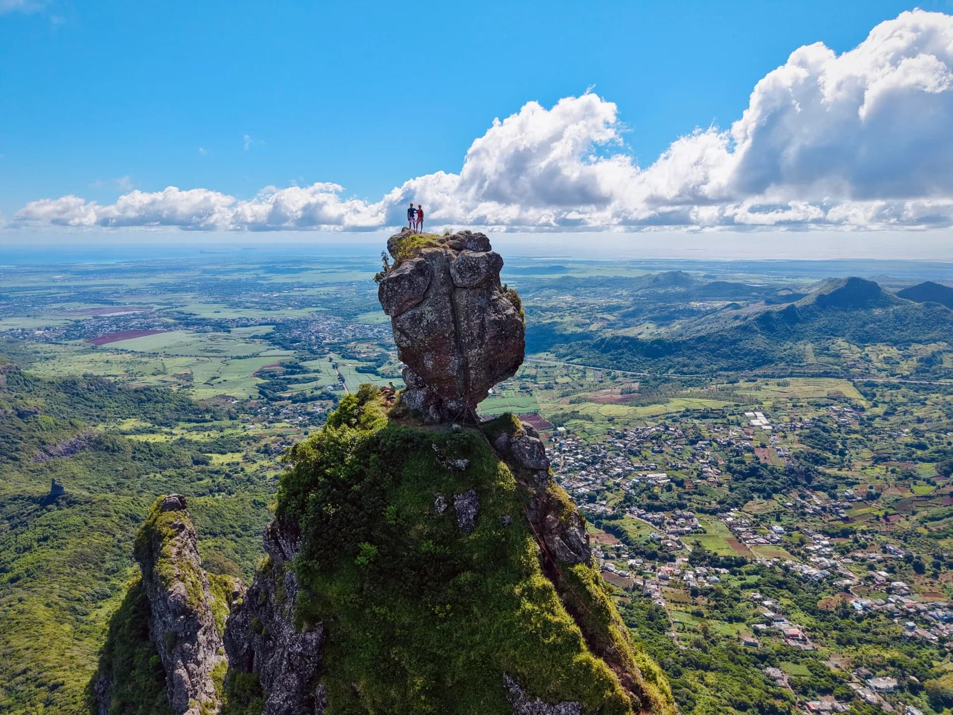 The distinctive boulder summit of Pieter Both above the Moka Range